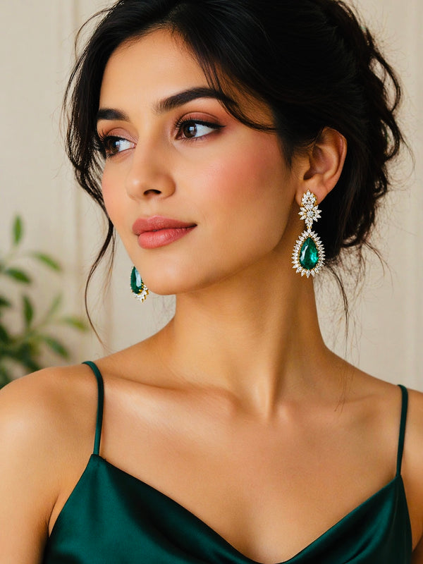 Moissanite and emerald earrings