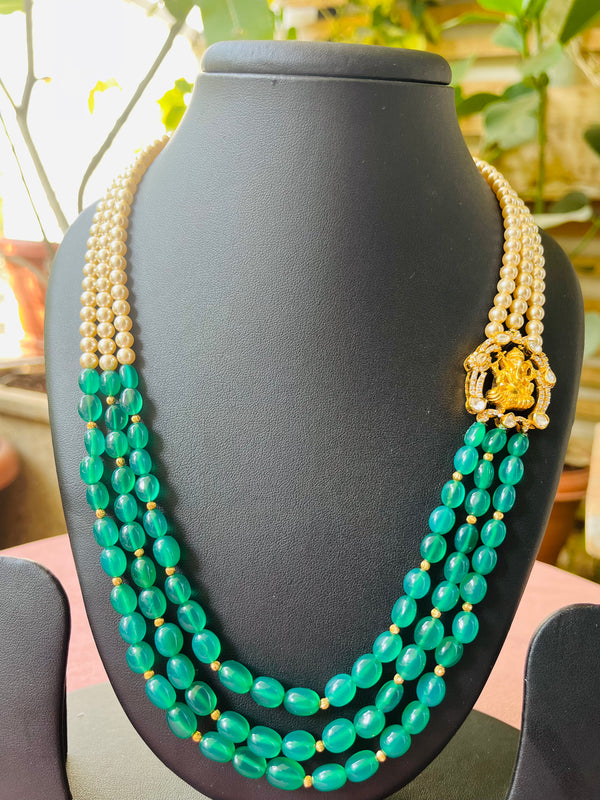 Ivika 3 lines onex and pearl necklace with Ganeshji side broach